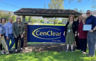 BHARP with CenClear in front of the CenClear sign